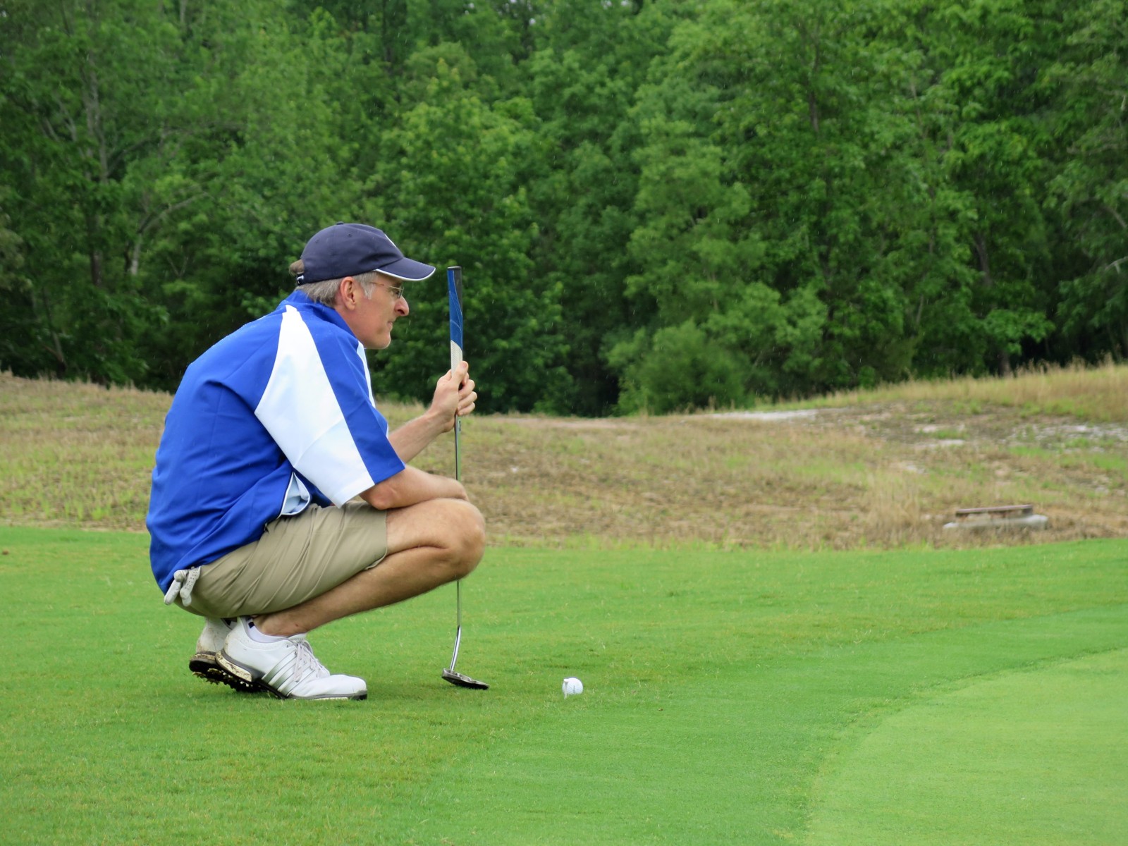 man golfer at golfing in golf tournament at golf course at Mossy Oak Properties Charity Event